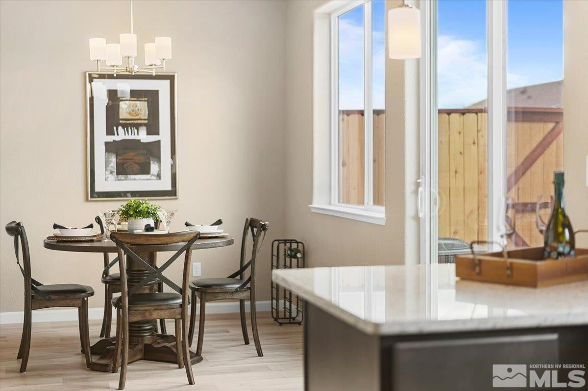 1164 Arrastra Road, Unit LOT 19 Reno, NV 89512 - Photo 9 of 34 a dining room with furniture and window