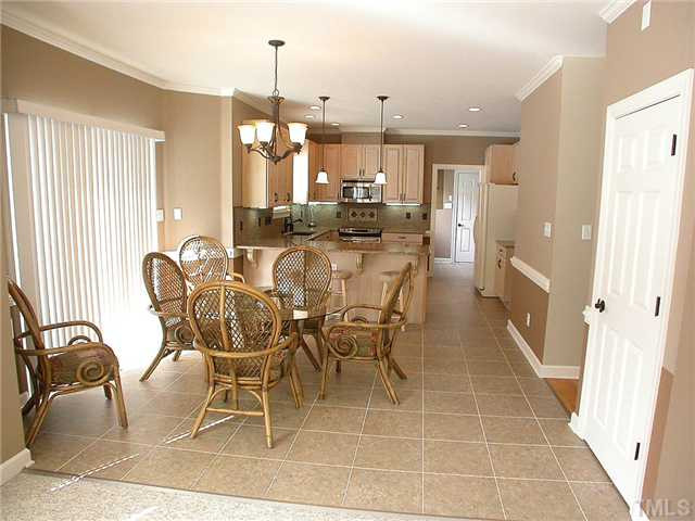 11516 John Allen Road Raleigh, NC 27614 - Photo 7 of 25 Tile flooring. Sliding glass door to deck and pool area. Breakfast Area