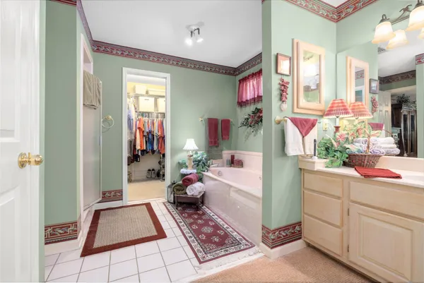 a view of living room with furniture and a potted plant