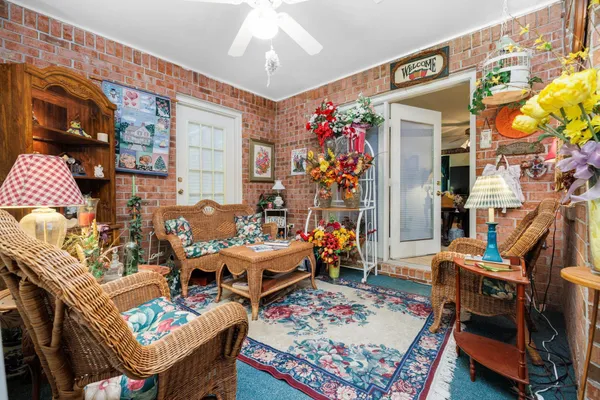 a very nice looking living room with furniture and a rug