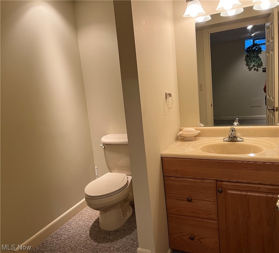 185 B Mathews Road Youngstown, OH 44512 - Photo 25 of 35 Bathroom featuring vanity and mirror