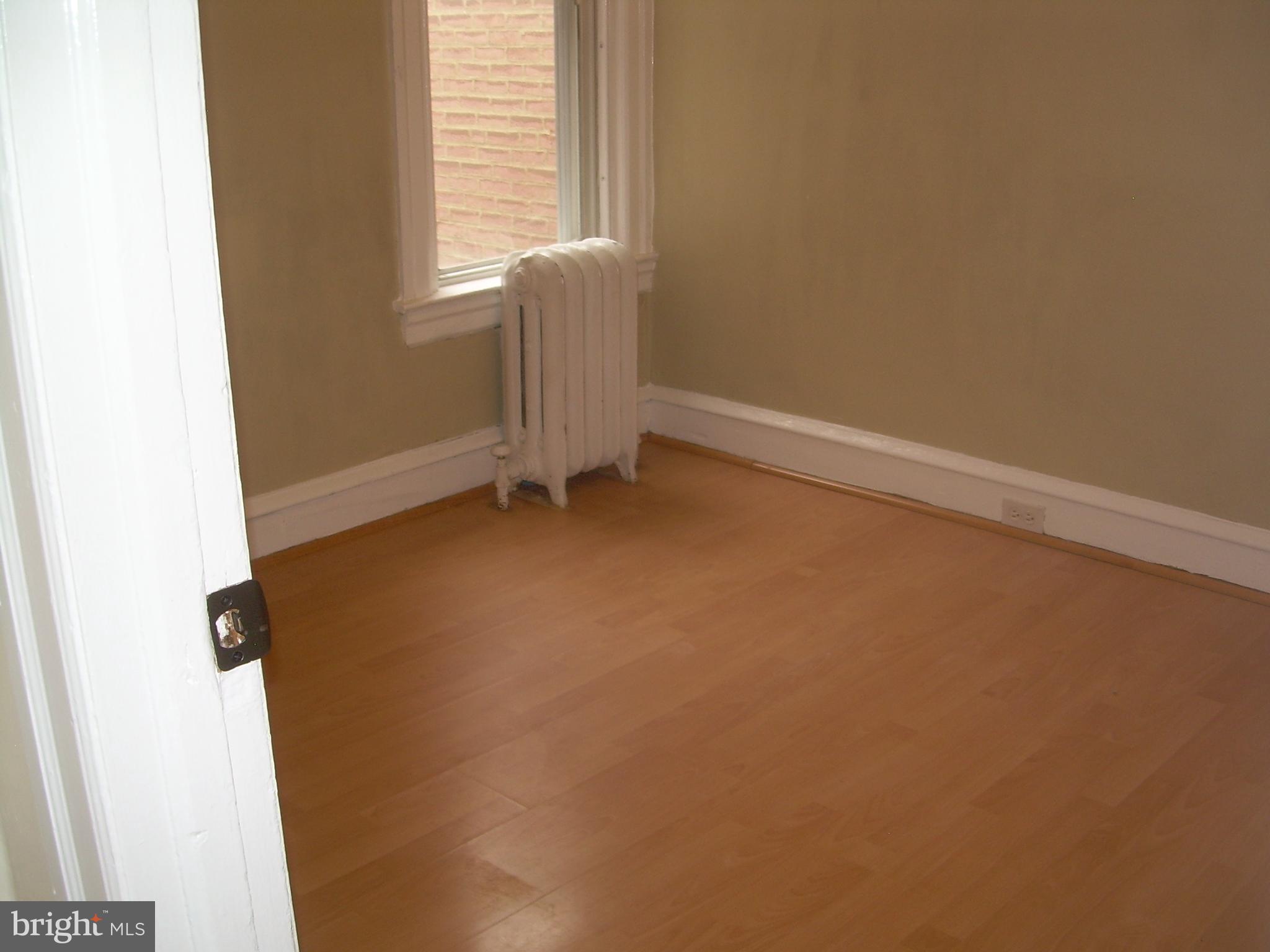 996 Anchor Street Philadelphia, PA 19124 - Photo 17 of 30 a view of an empty room and a window