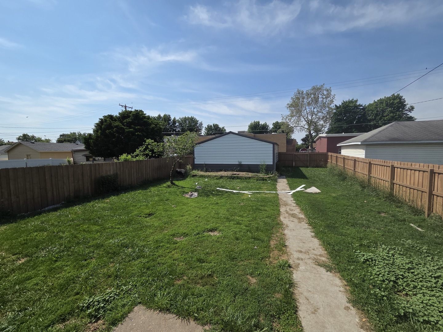 335 6th Avenue North Clinton, IA 52732 - Photo 21 of 23 a view of a garden with an outdoor space