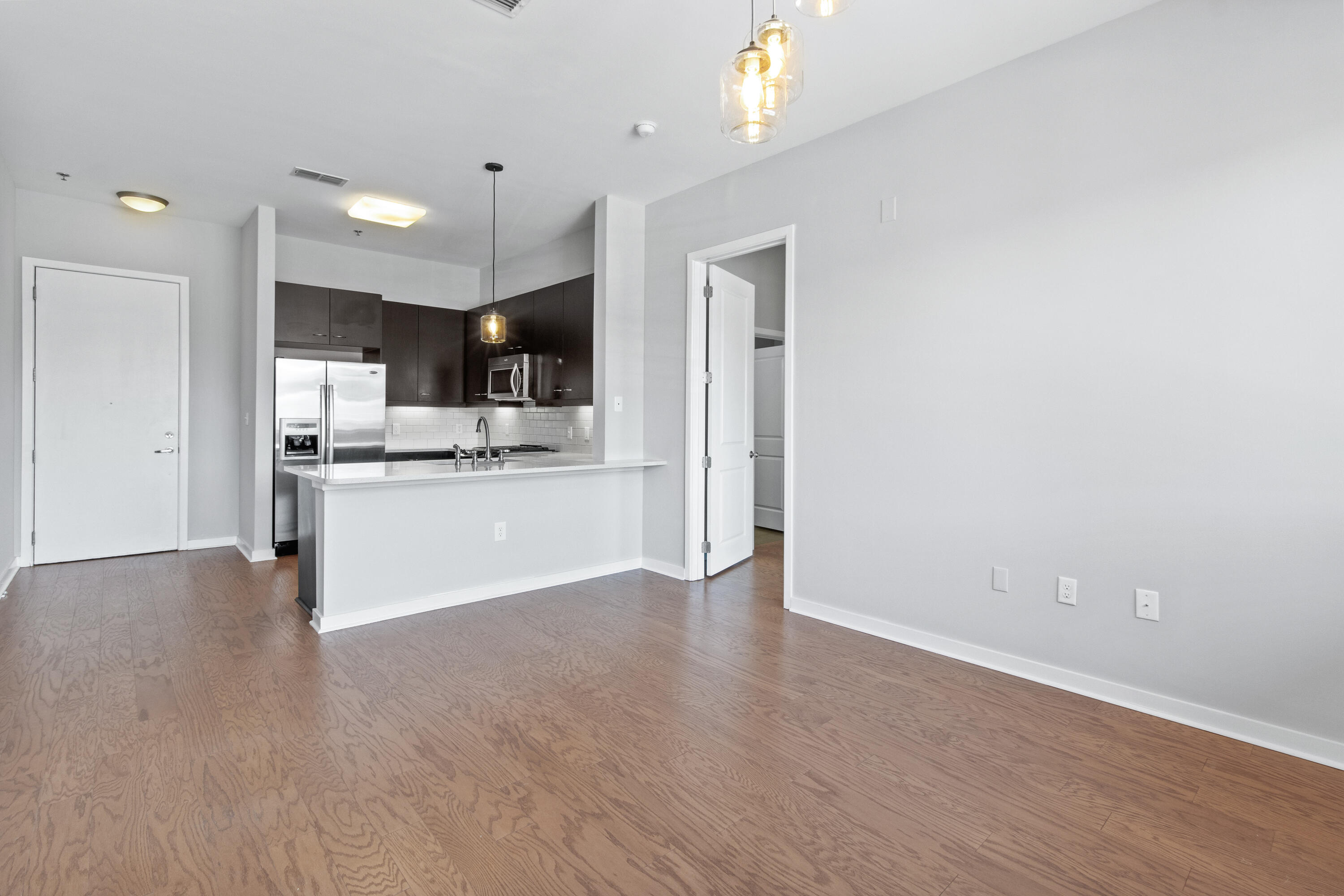 200 Manufacturers Road, Unit 235 Chattanooga, TN 37405 - Photo 4 of 23 Living Room to Kitchen