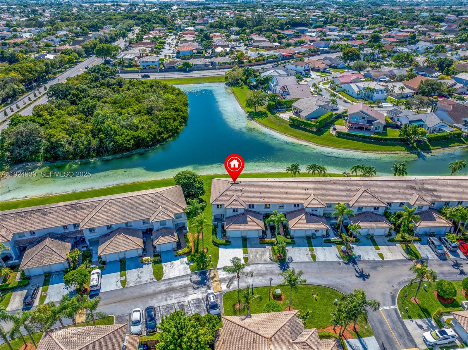 16236 Southwest 75th Street Miami, FL 33193 - Photo 16 of 53 an aerial view of a city with lots of residential buildings ocean and mountain view in back