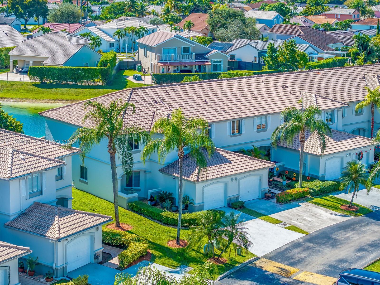 16236 Southwest 75th Street Miami, FL 33193 - Photo 3 of 53 a aerial view of a house with swimming pool garden and patio