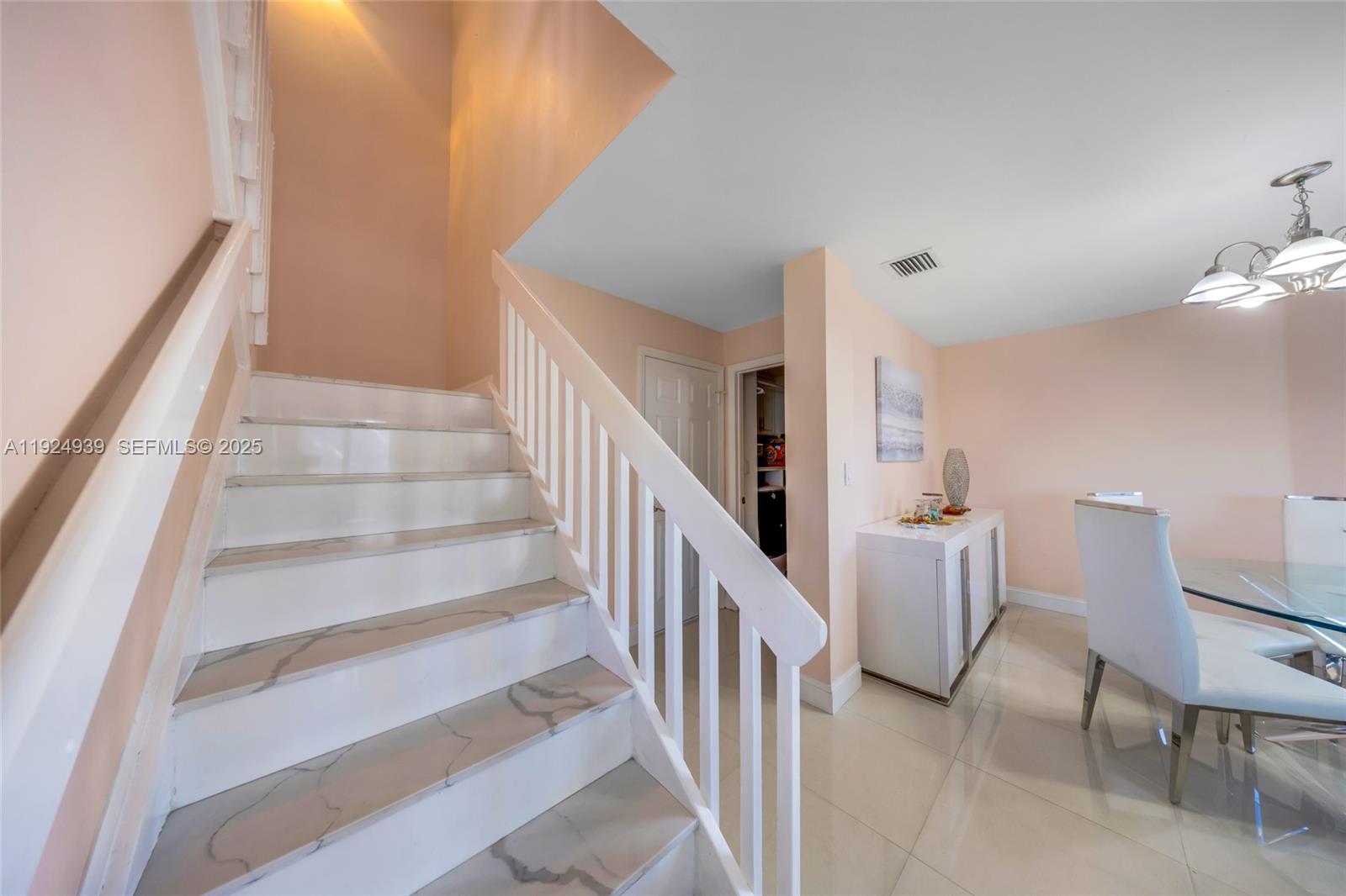 16236 Southwest 75th Street Miami, FL 33193 - Photo 33 of 53 a view of staircase with white walls and white walls