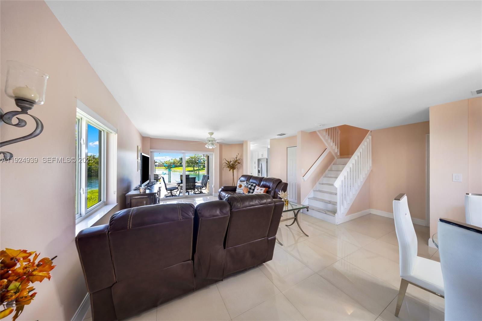 16236 Southwest 75th Street Miami, FL 33193 - Photo 47 of 53 a living room with furniture and a large window
