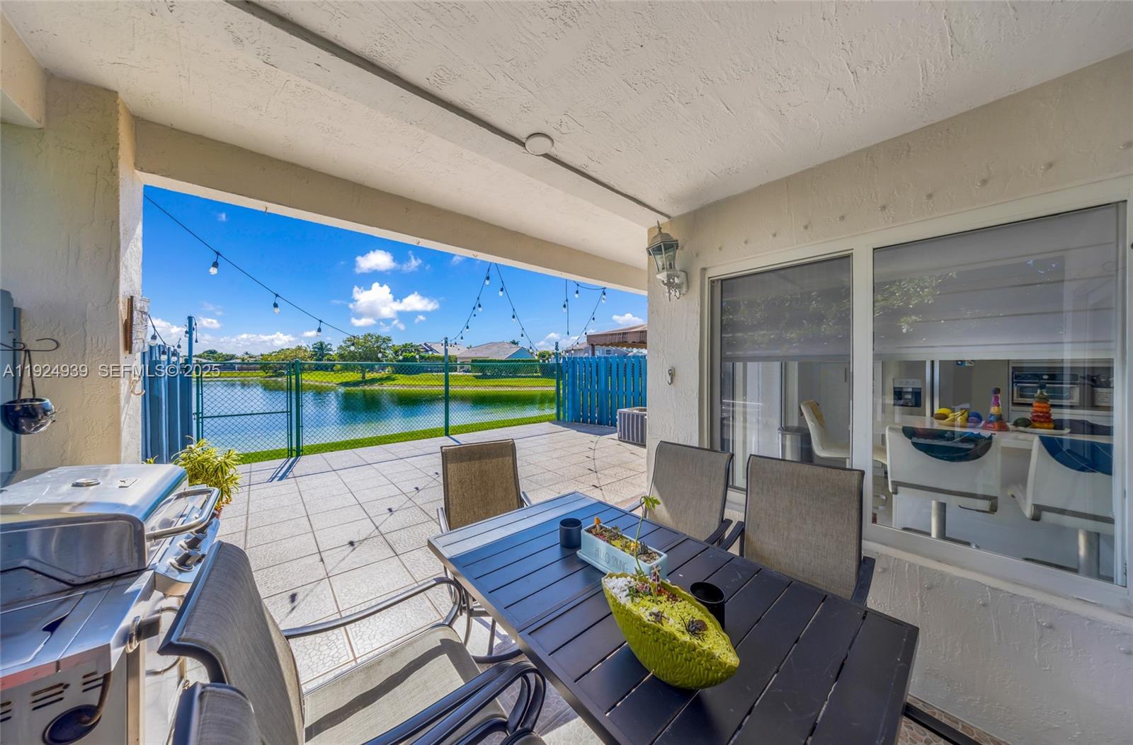 16236 Southwest 75th Street Miami, FL 33193 - Photo 48 of 53 a living room with furniture and a large window