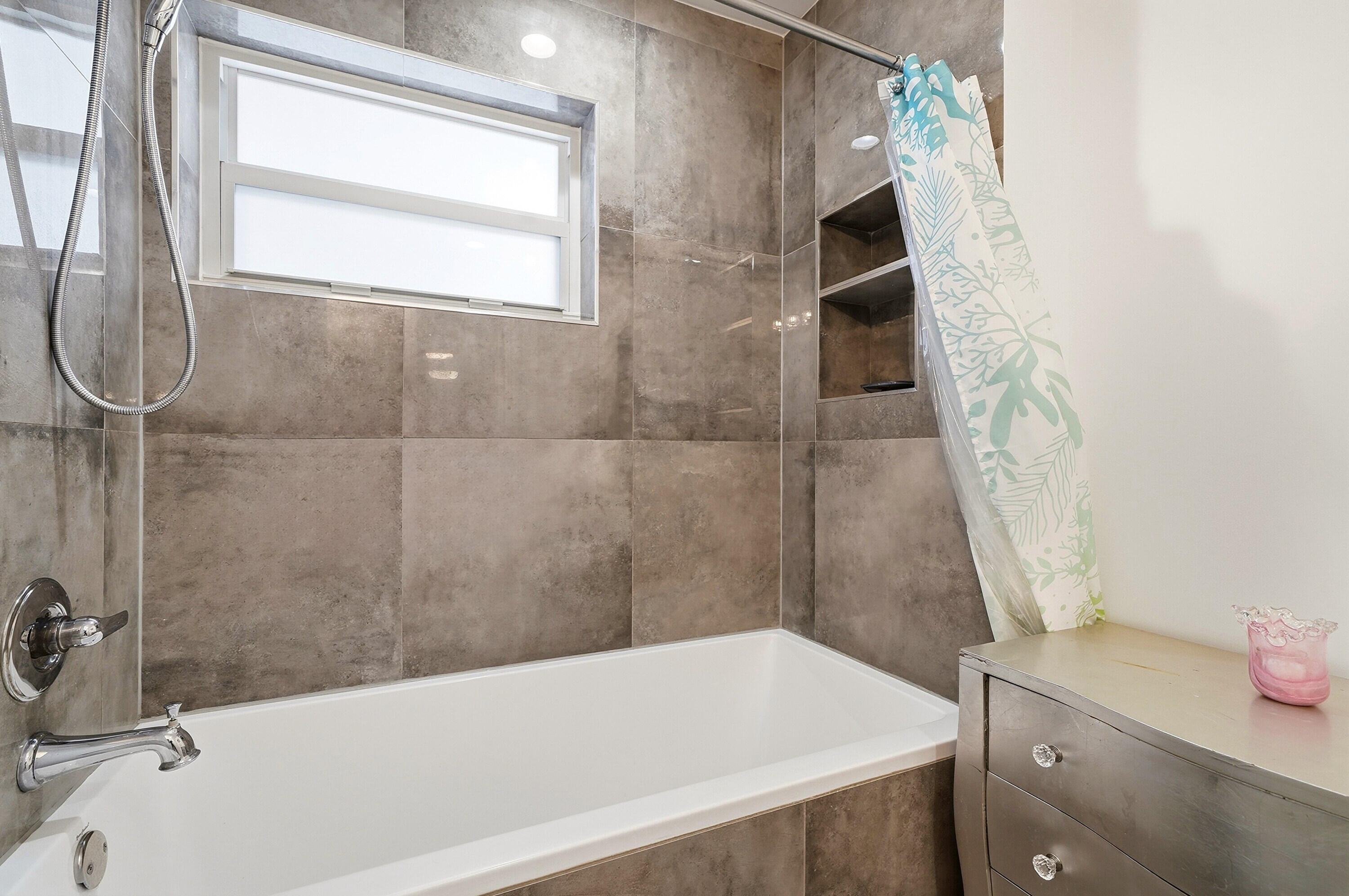 3510 Harrison Street, Unit 4 Hollywood, FL 33021 - Photo 16 of 31 a bathroom with a sink and a bathtub