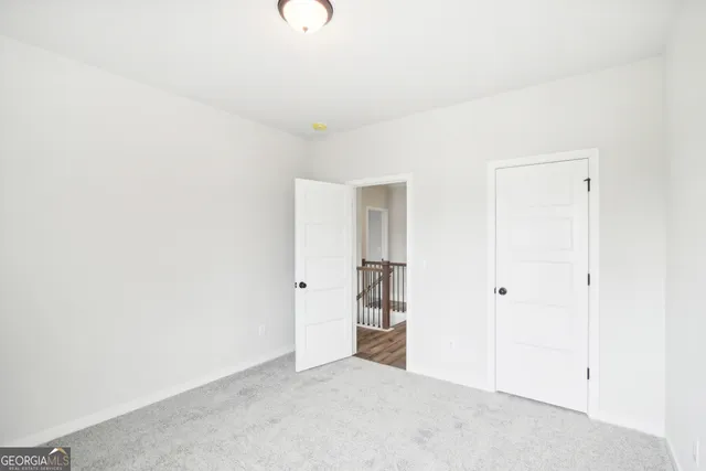 a bathroom with a sink double vanity granite tub shower and a mirror