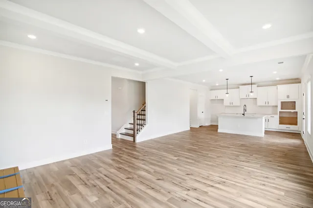 a bathroom with a sink mirror toilet and bathtub