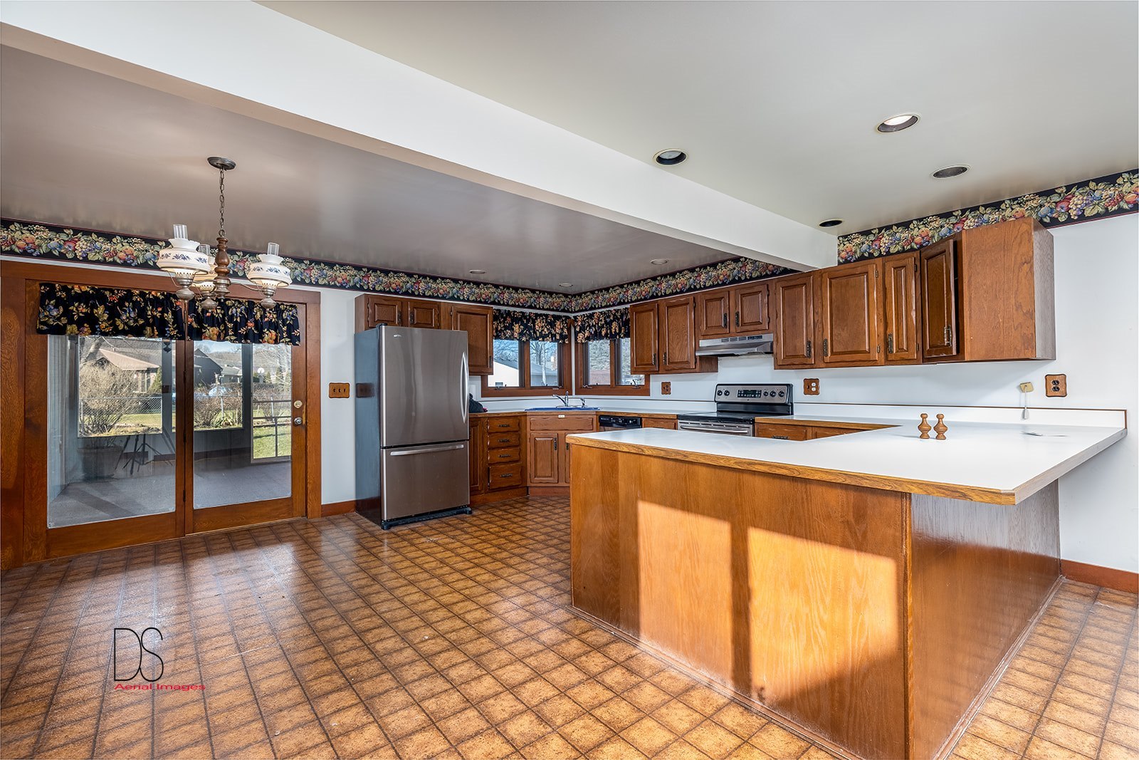 2113 Fields Place Ottawa, IL 61350 - Photo 8 of 28 a kitchen with granite countertop a sink cabinets and stainless steel appliances