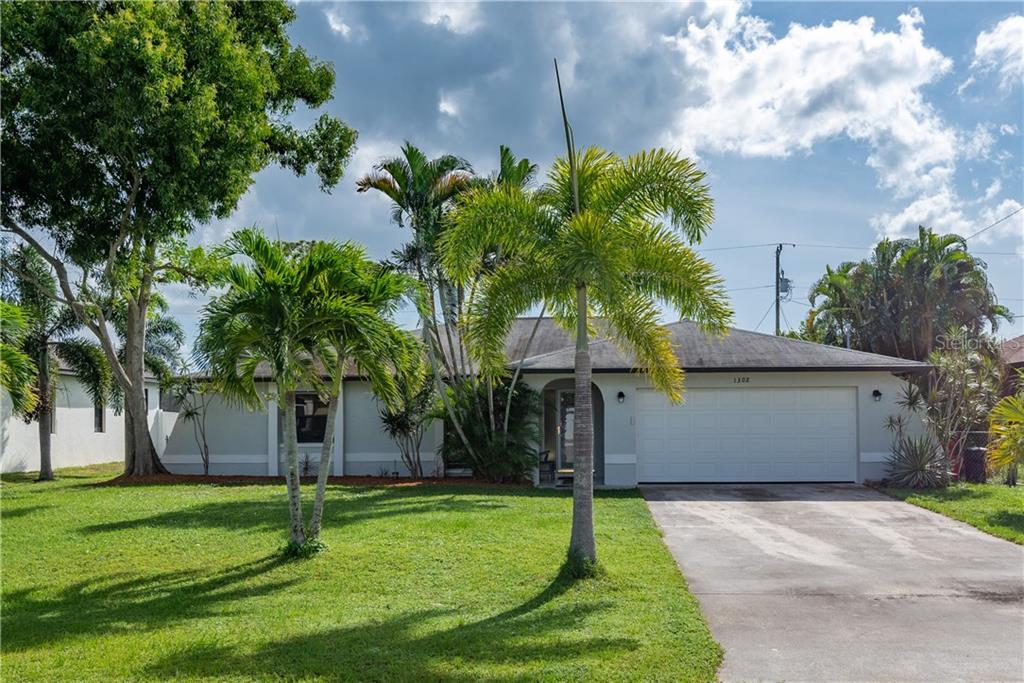 Beautifully remodeled 3/2/2 pool home in desirable SW Cape Coral.