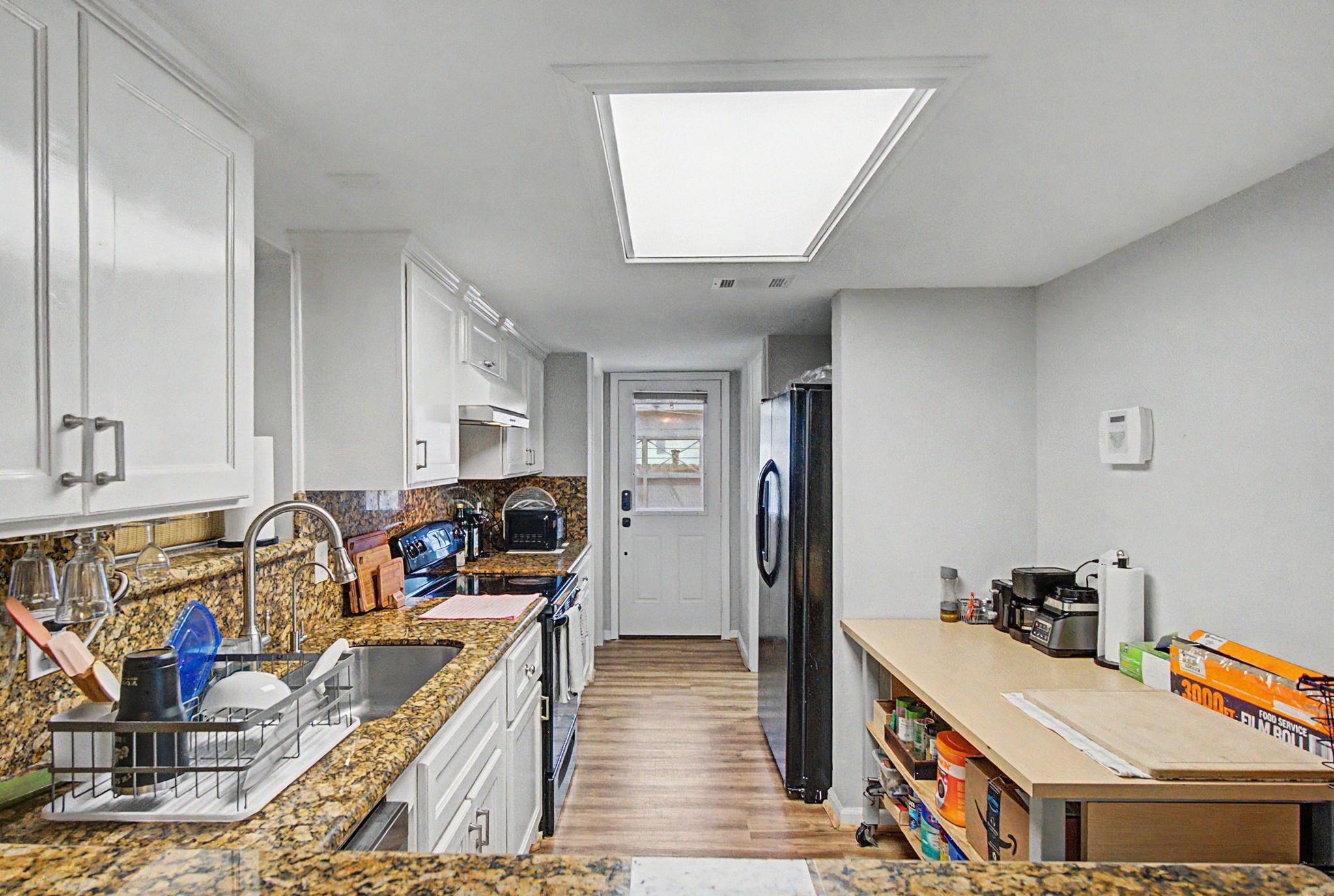 10034 Alfred Lane Houston, TX 77041 - Photo 18 of 50 From meal prep to hosting friends, this kitchen offers the space and layout to do it all with ease.