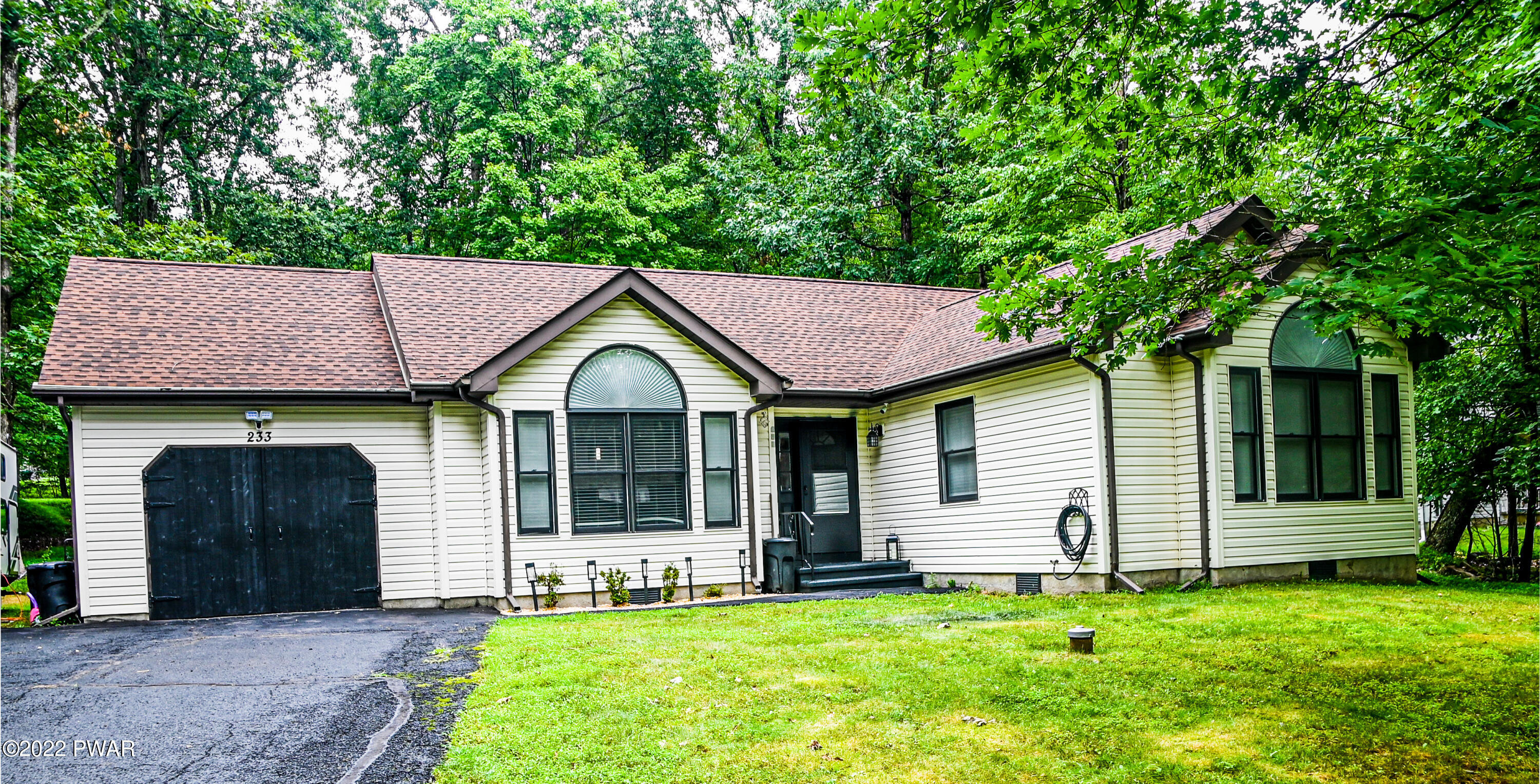 233 Bromley Road Henryville, PA 18332 - Photo 2 of 22 a view of a house with a yard
