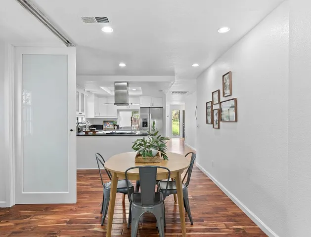 a workspace with furniture and a window