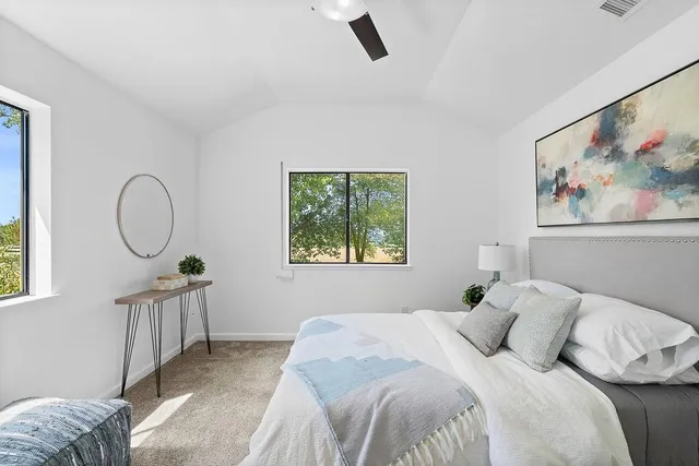 a view of a lake with a building in the background