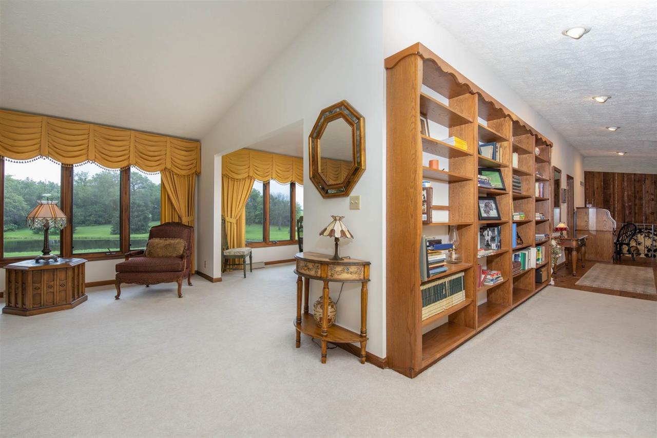 7676 Swanson Road Roscoe, IL 61073 - Photo 12 of 39 a living room with furniture