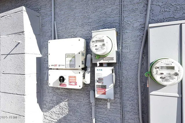 a view of a hallway with washer and dryer