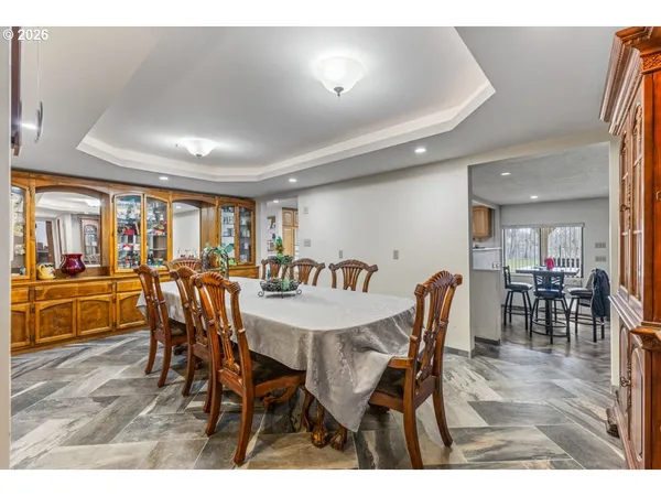 a view of a dining area with furniture and wooden floor