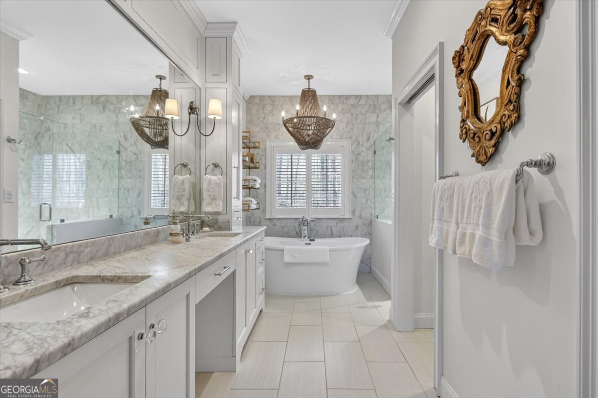 242 Pebblebrook Lane Macon, GA 31220 - Photo 11 of 45 a bathroom with a granite countertop sink a toilet and shower