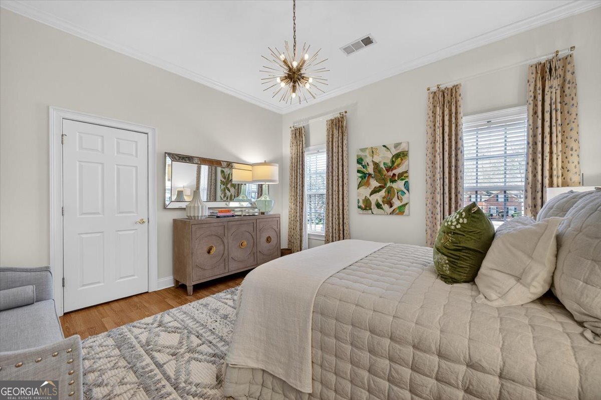 242 Pebblebrook Lane Macon, GA 31220 - Photo 26 of 45 a bedroom with a bed and ceiling fan