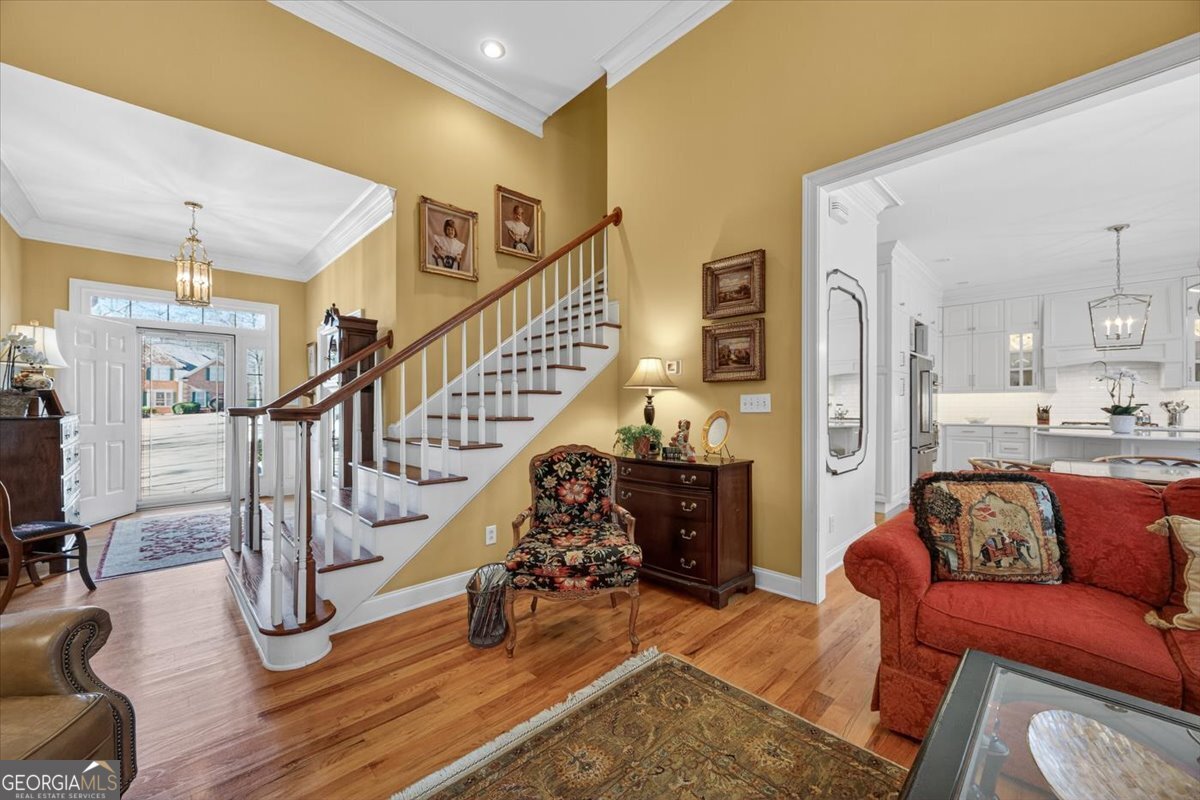 242 Pebblebrook Lane Macon, GA 31220 - Photo 3 of 45 a livingroom with furniture a dining table and chairs