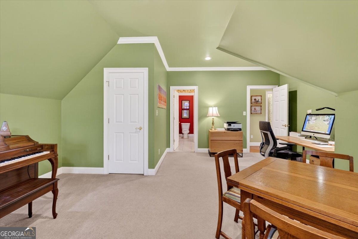 242 Pebblebrook Lane Macon, GA 31220 - Photo 31 of 45 a view of a dining room with furniture and a wooden floor