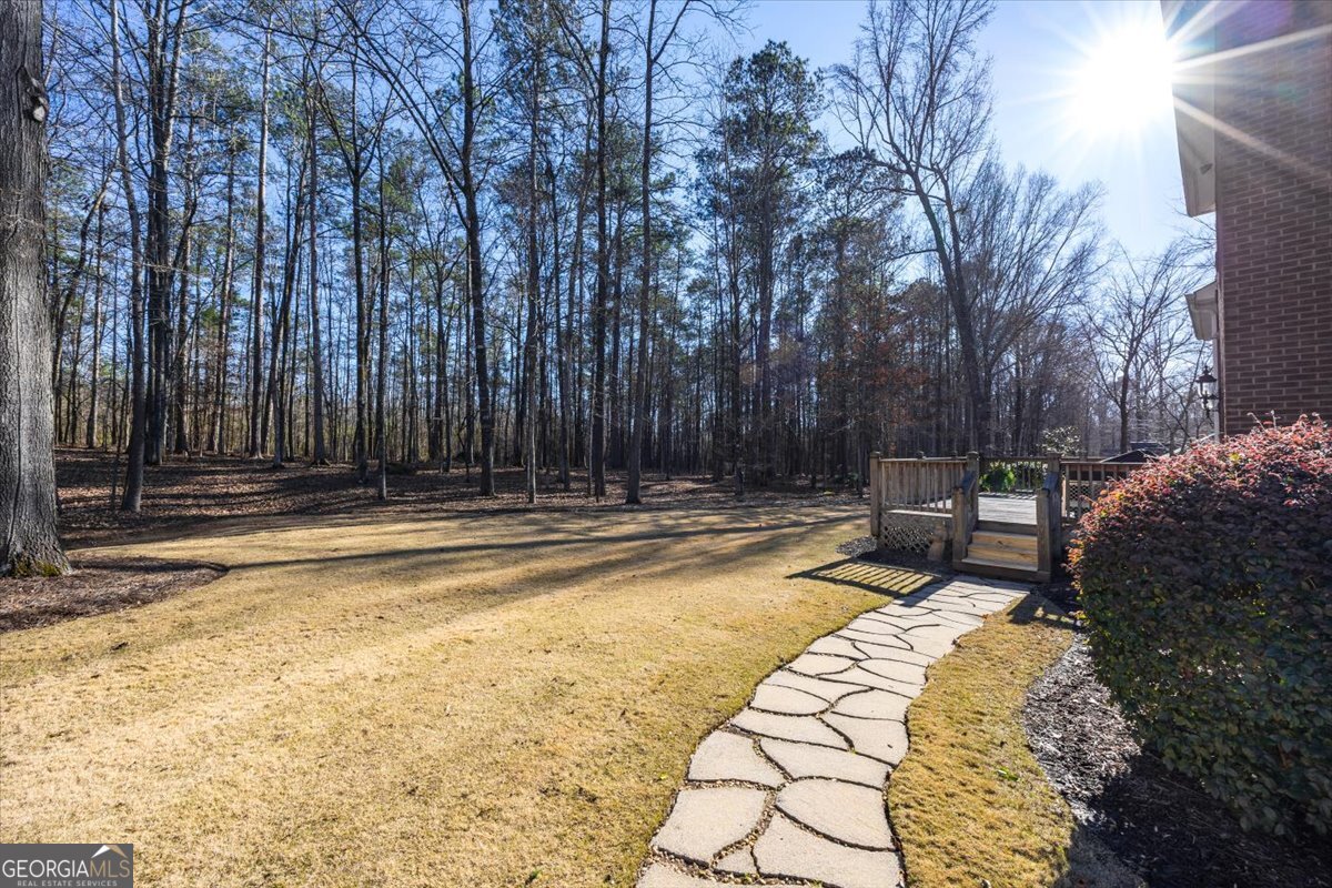 242 Pebblebrook Lane Macon, GA 31220 - Photo 37 of 45 a swimming pool with wooden fence