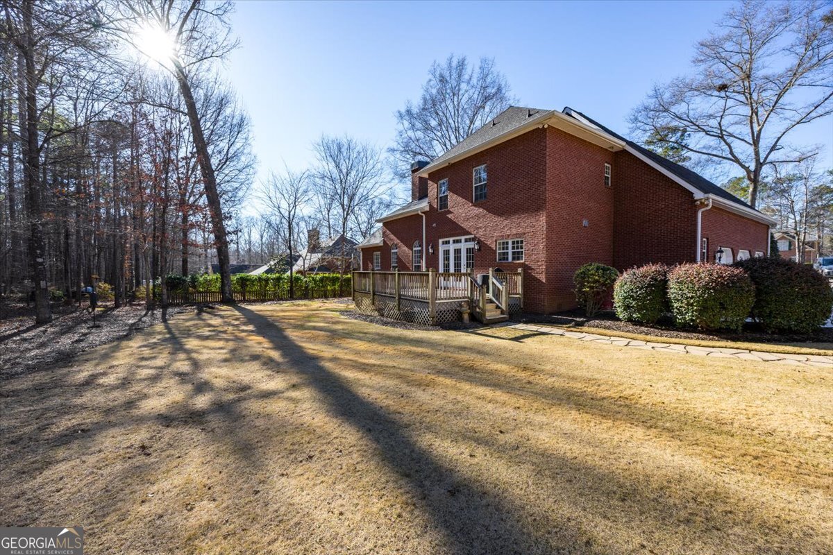 242 Pebblebrook Lane Macon, GA 31220 - Photo 39 of 45 a front view of a house with a yard