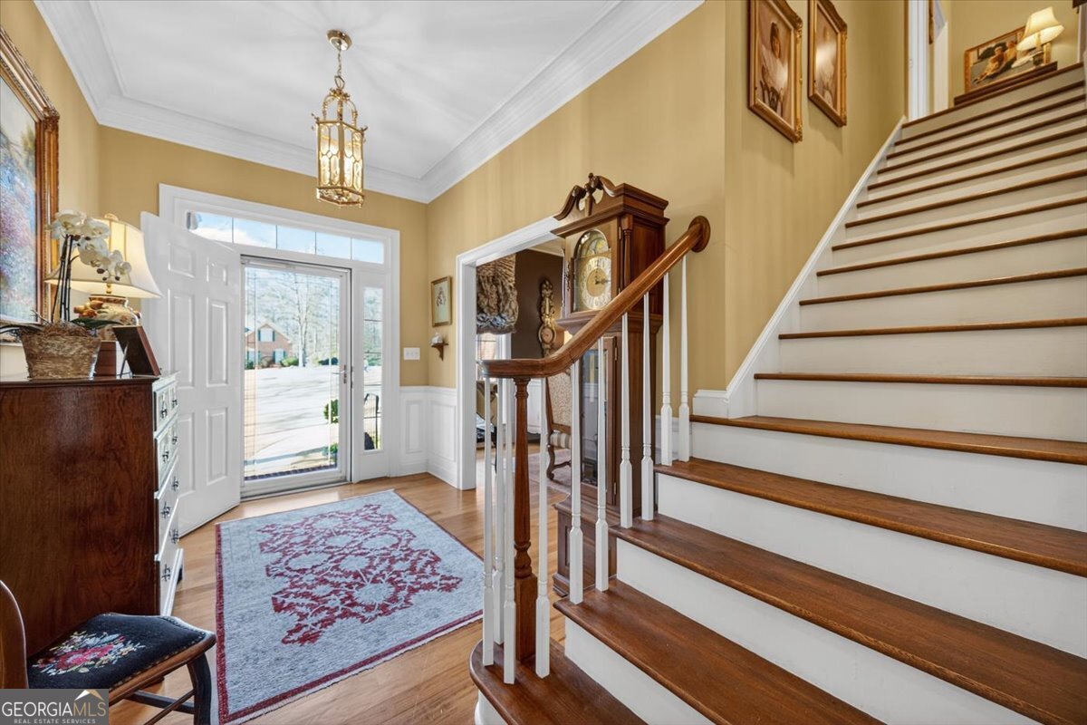 242 Pebblebrook Lane Macon, GA 31220 - Photo 4 of 45 a view of a livingroom with wooden floor and furniture