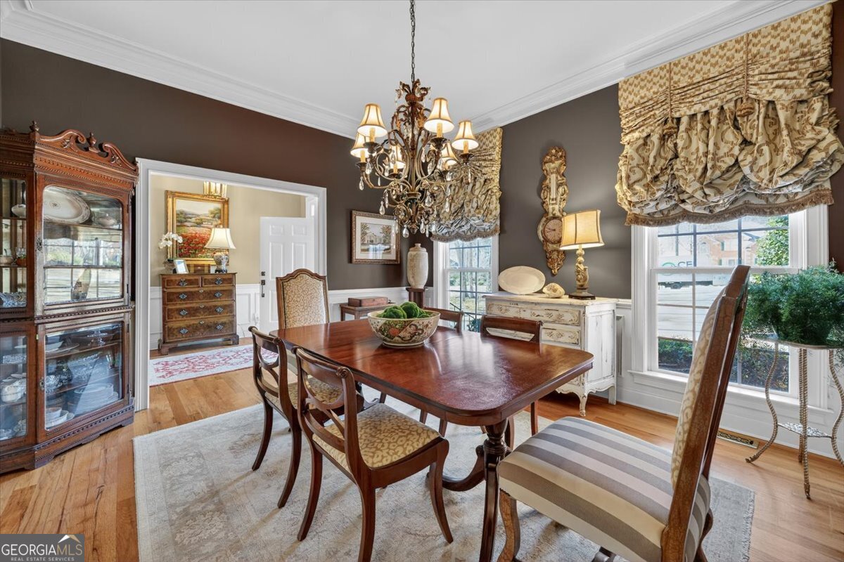 242 Pebblebrook Lane Macon, GA 31220 - Photo 10 of 45 a view of a dining room with furniture window and wooden floor
