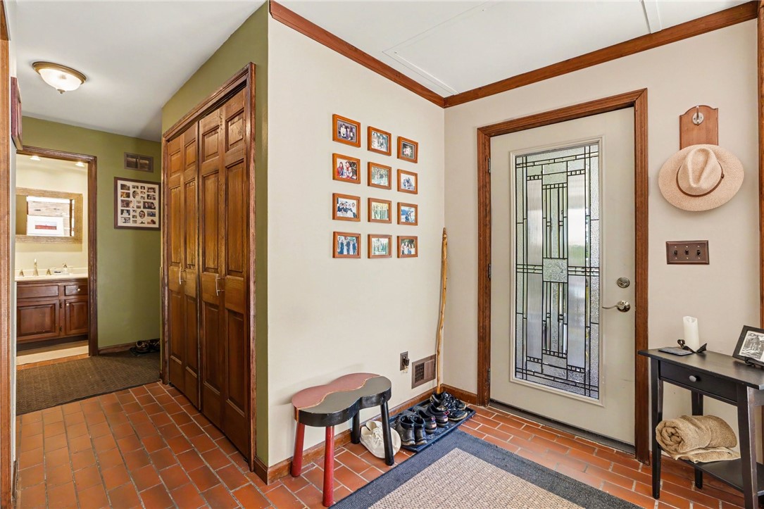 1722 Strong Road Victor, NY 14564 - Photo 2 of 33 Entryway with tile floor and double closet.