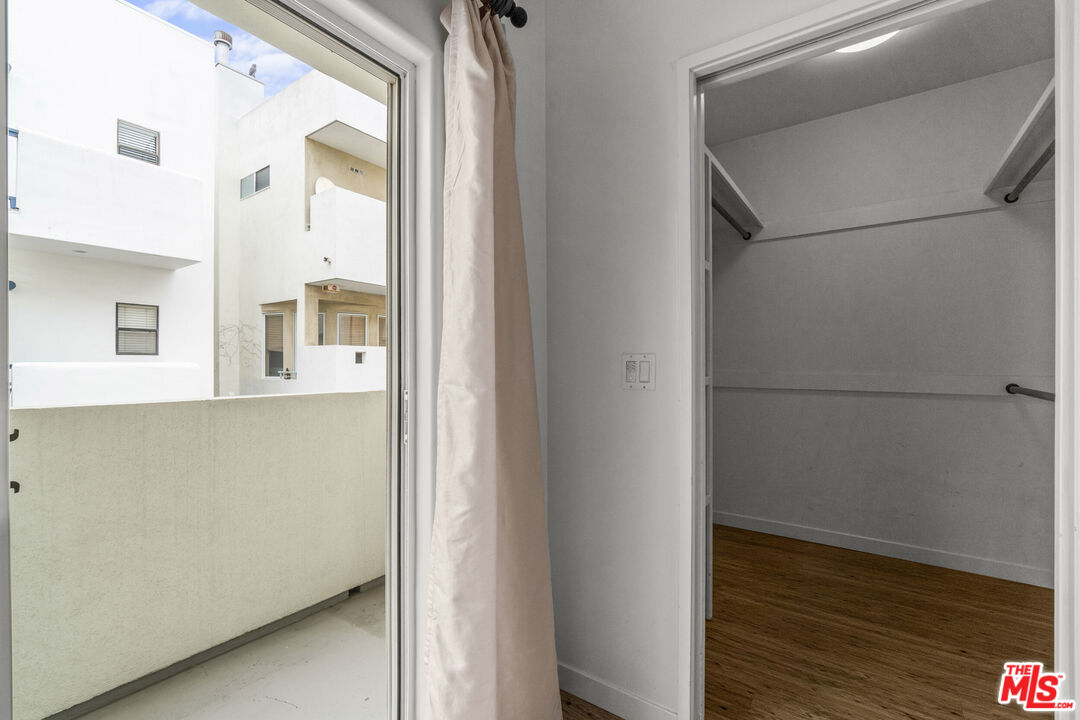 123 Galleon Street, Unit B Marina del Rey, CA 90292 - Photo 24 of 43 a view of a room with wooden floor and cabinet