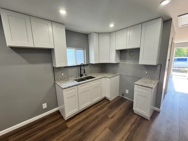 a utility room with a sink