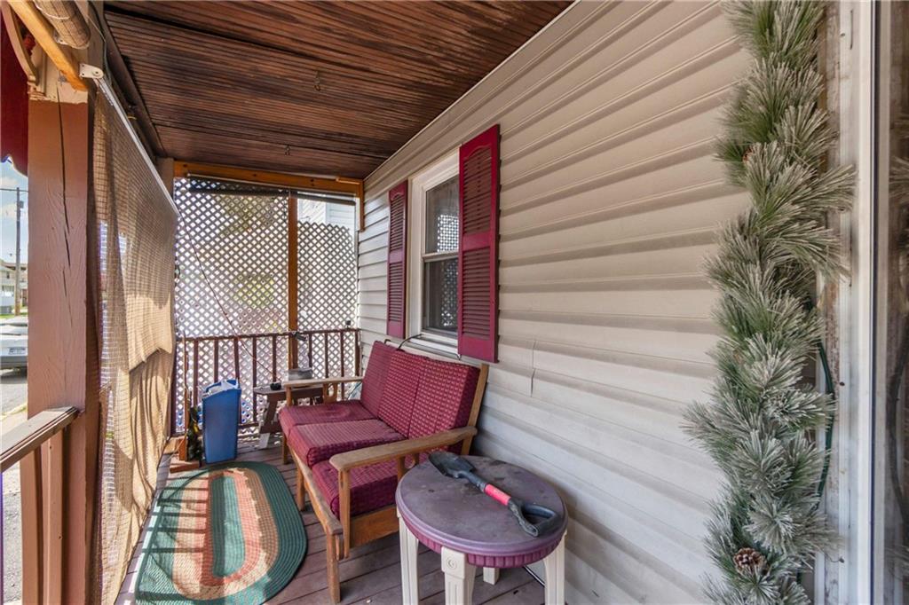 703 Indiana Avenue Monaca, PA 15061 - Photo 4 of 22 a outdoor living space with furniture