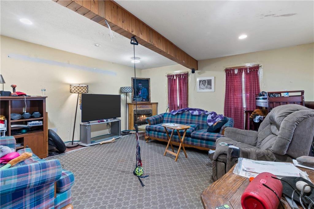 703 Indiana Avenue Monaca, PA 15061 - Photo 6 of 22 a living room with furniture and a flat screen tv