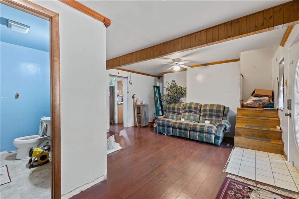 703 Indiana Avenue Monaca, PA 15061 - Photo 8 of 22 a bedroom with furniture and a window