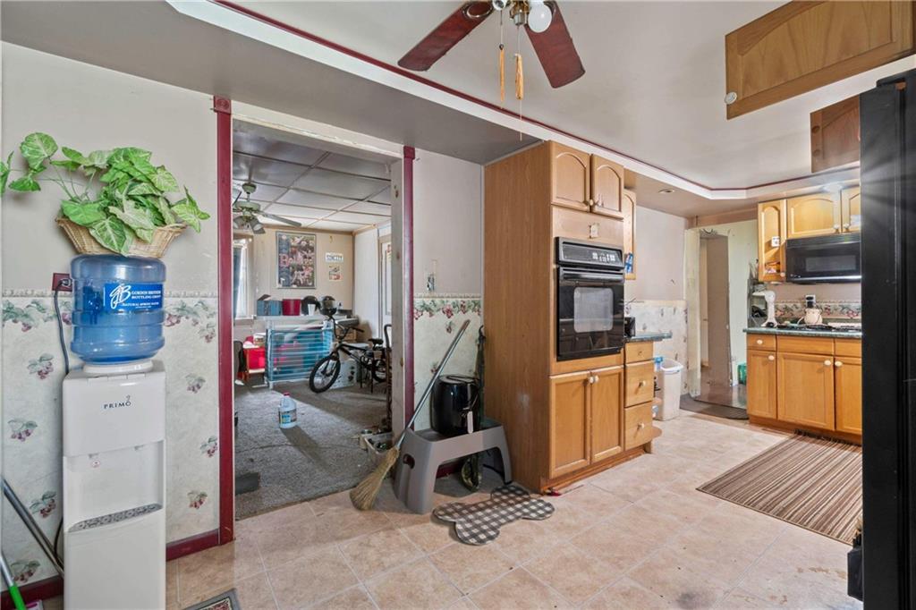 703 Indiana Avenue Monaca, PA 15061 - Photo 9 of 22 a view of a hallway with workspace