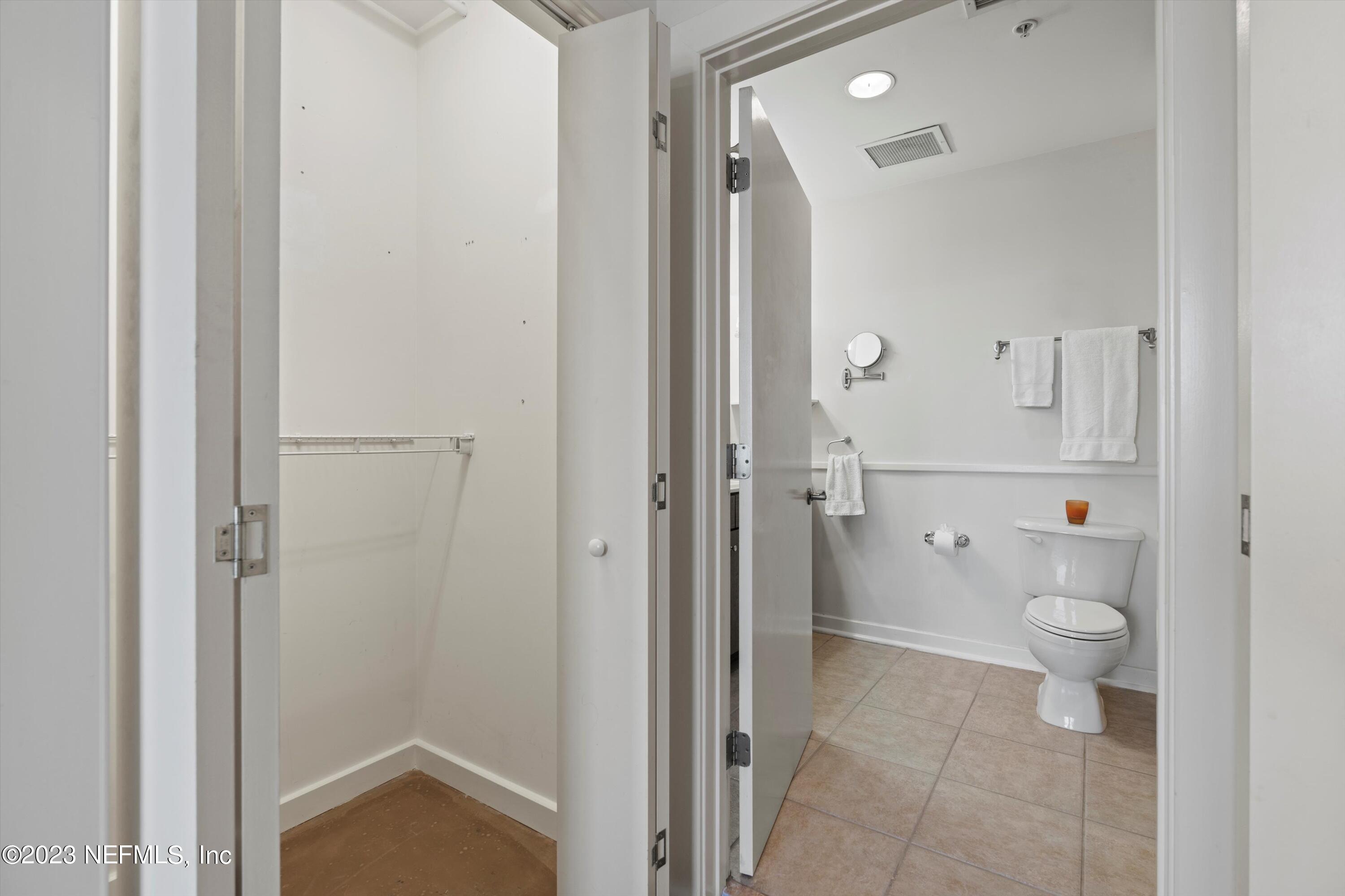 1661 Riverside Avenue, Unit 211 Jacksonville, FL 32204 - Photo 11 of 32 a bathroom with a granite countertop sink