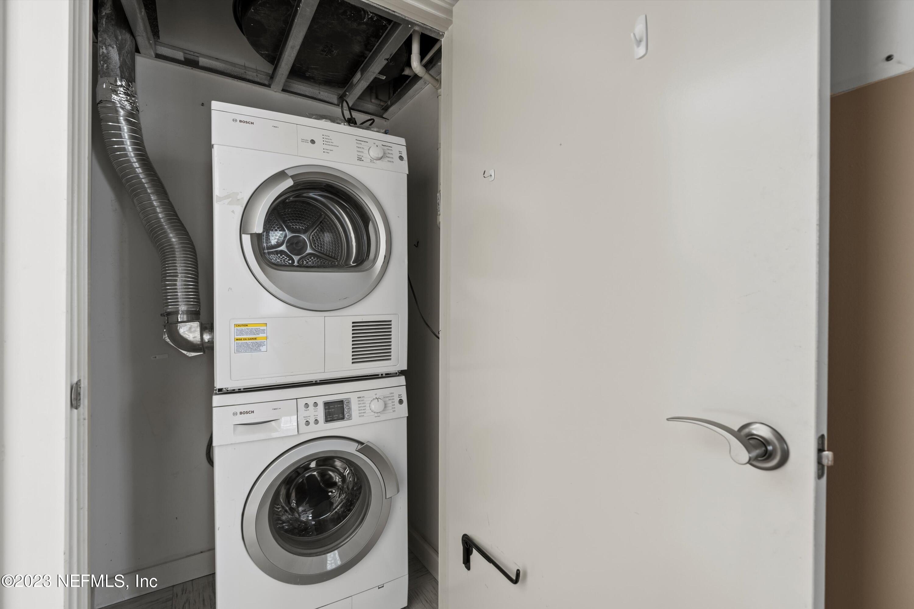 1661 Riverside Avenue, Unit 211 Jacksonville, FL 32204 - Photo 13 of 32 a utility room with dryer and washer