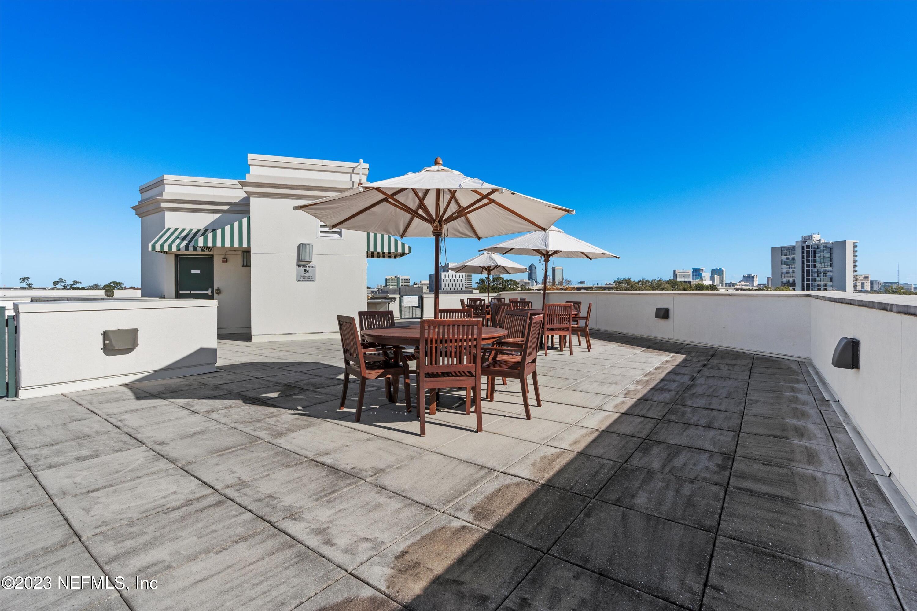 1661 Riverside Avenue, Unit 211 Jacksonville, FL 32204 - Photo 15 of 32 a view of a terrace with sitting area