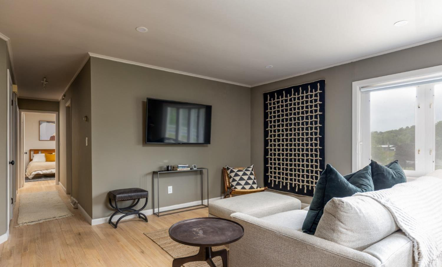 875 Road 23B Leeds, NY 12451 - Photo 23 of 38 a living room with furniture and a chair