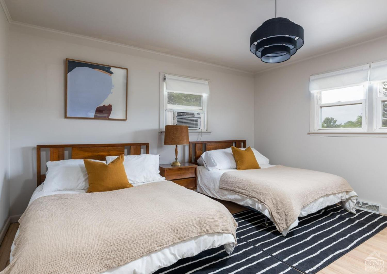 875 Road 23B Leeds, NY 12451 - Photo 27 of 38 a bedroom with two beds and a chandelier