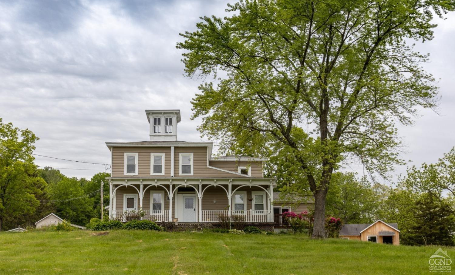 875 Road 23B Leeds, NY 12451 - Photo 31 of 38 a front view of a house with a garden