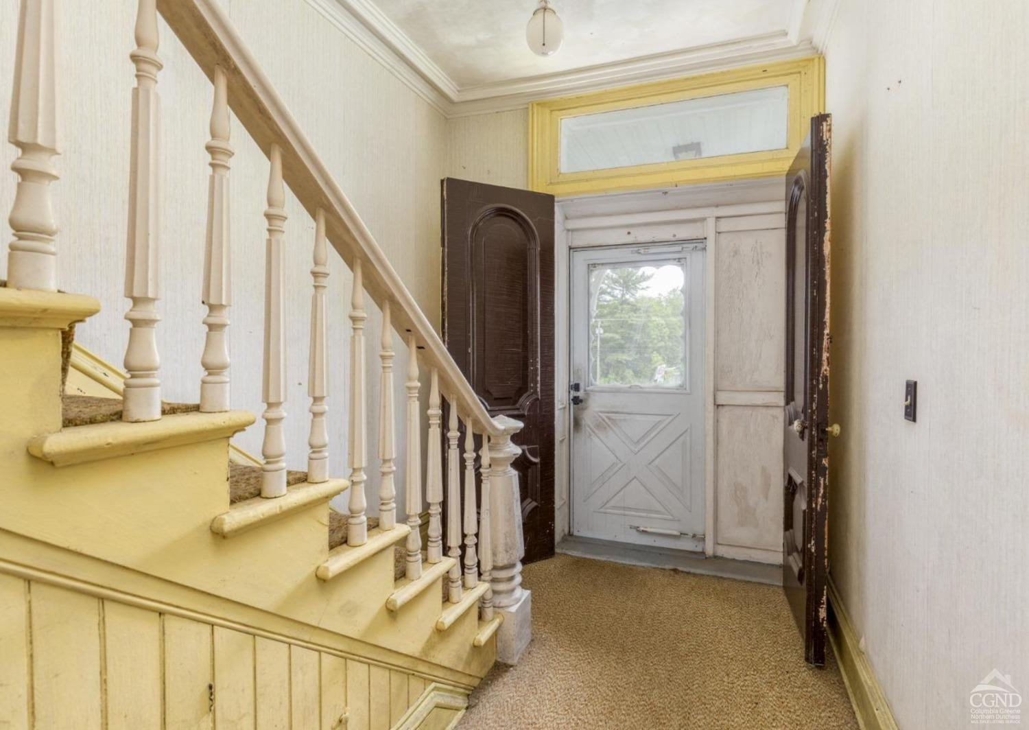 875 Road 23B Leeds, NY 12451 - Photo 34 of 38 a view of a hallway with wooden floor and staircase