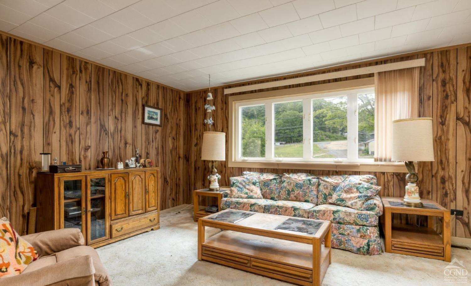 875 Road 23B Leeds, NY 12451 - Photo 38 of 38 a living room with furniture and a large window