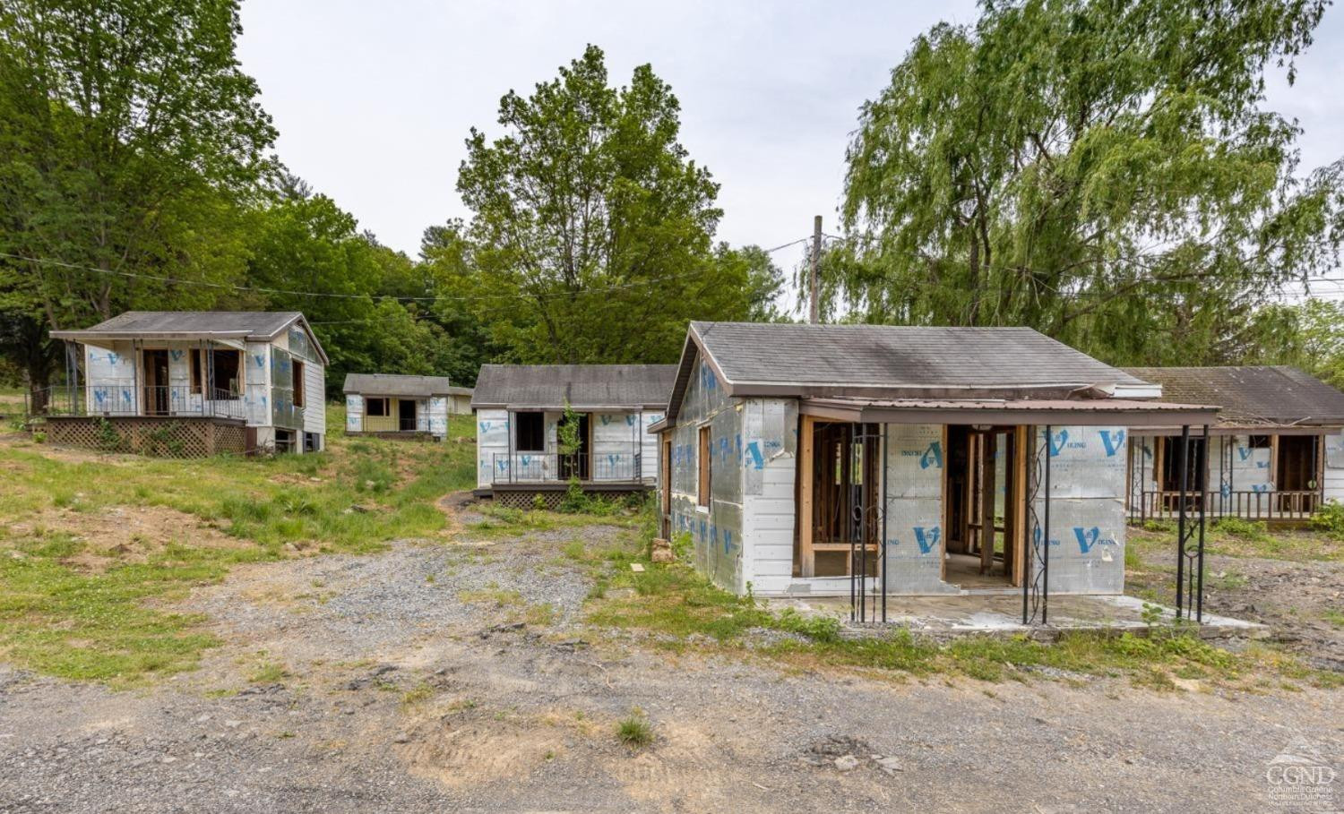 875 Road 23B Leeds, NY 12451 - Photo 5 of 38 front view of a house with a yard