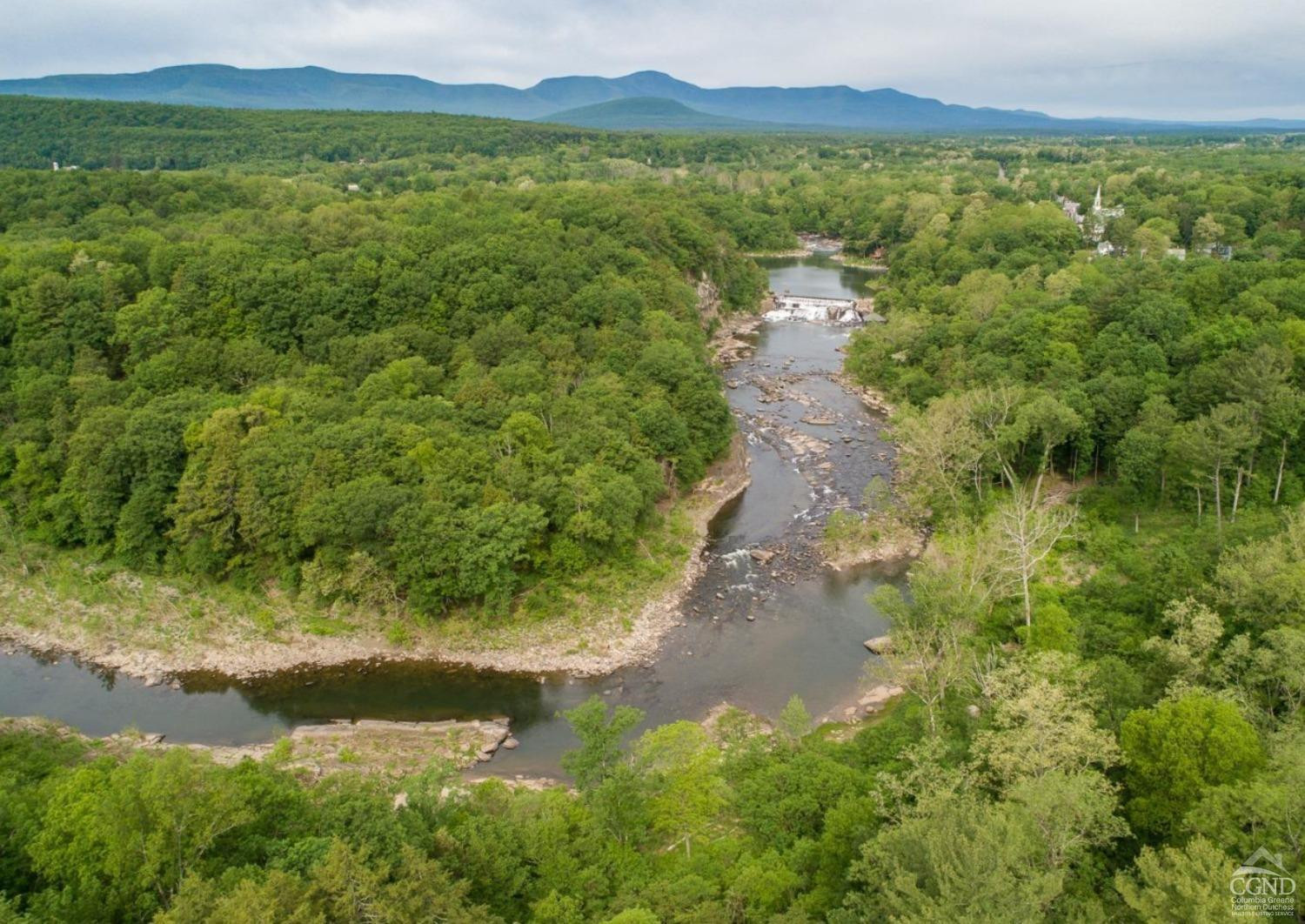 875 Road 23B Leeds, NY 12451 - Photo 9 of 38 a view of a lake with a city